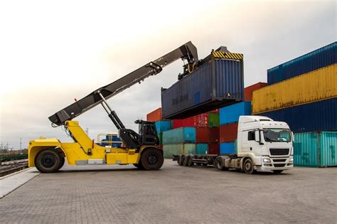 Premium Photo | Truck while loading in logistic shipping yard with ...