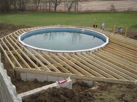 Deck Designs For Above Ground Pools | pool deck retaining wall … | Pool ...