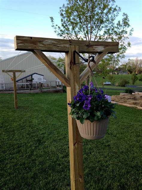 DIY AFTERNOON PROJECT: CLOTHESLINE | Diy clothesline outdoor, Diy outdoor, Backyard