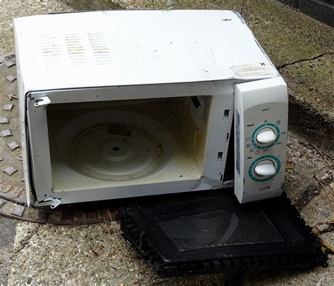 Discarded Faulty Microwave Oven Free Stock Photo - Public Domain Pictures