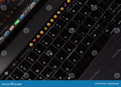 Closeup New Macbook Pro 2016 Keyboard Showing Illuminated and Emoji on Touch Bar Editorial ...