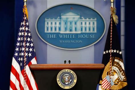 The empty speaker podium in the Brady Press Briefing Room of the White House in Washington, D.C ...