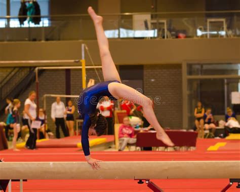 Young Gymnast Girl Performing Routine on Balance Beam Stock Photo - Image of performance ...