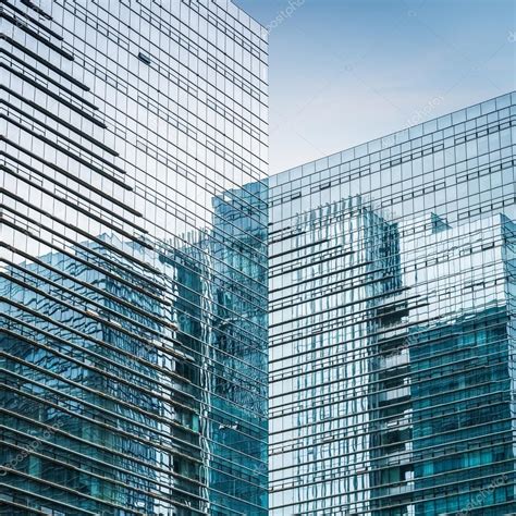 Modern glass skyscraper closeup Stock Photo by ©chungking 54229287