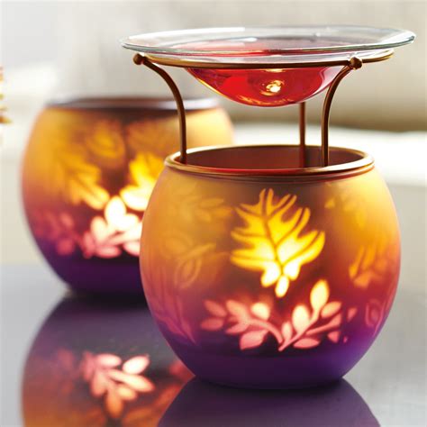 The warmth of the Tealight gently heats up the Scent Plus Melts in the dish and the fragrance is ...