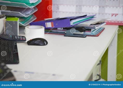 Close-up Of Real Life Messy Desk In Office Stock Images - Image: 31842514