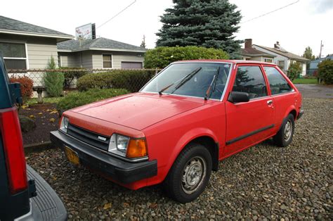 OLD PARKED CARS.: 1985 Mazda GLC.