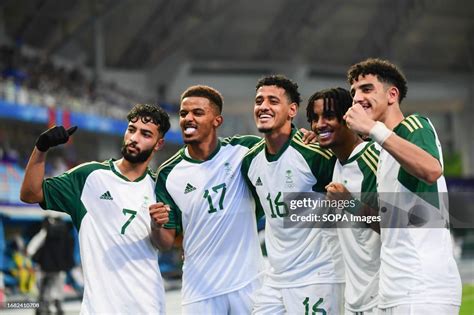 Saudi Arabia football team players pose for a group photo during the ...