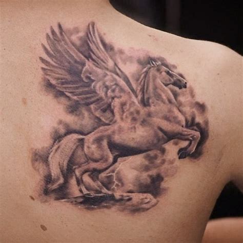 Beautiful pegasus tattoo on shoulder blade - Tattooimages.biz