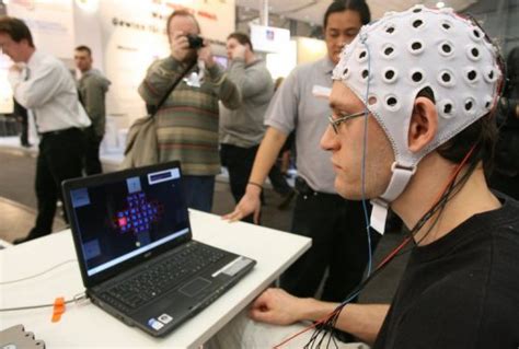 Japan eyes 'mind-reading' devices, robots by 2020: report