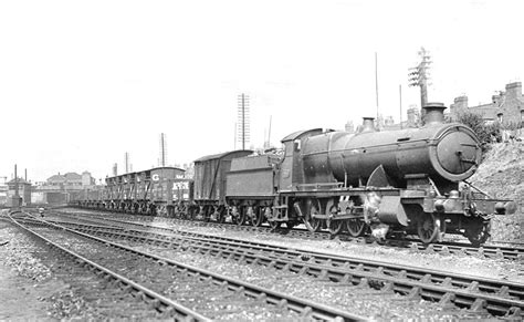 Tyseley Shed: GWR 2-8-0 28xx Class No 2800 is seen leaving Tyseley station at the head of an up ...