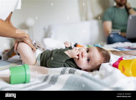 Man change baby diaper hi-res stock photography and images - Alamy