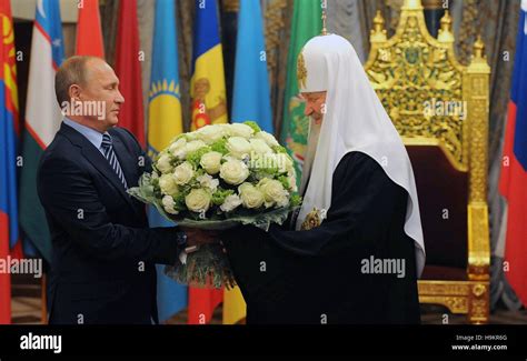 Russian President Vladimir Putin wishes a happy birthday to Russian Orthodox Patriarch Kirill at ...