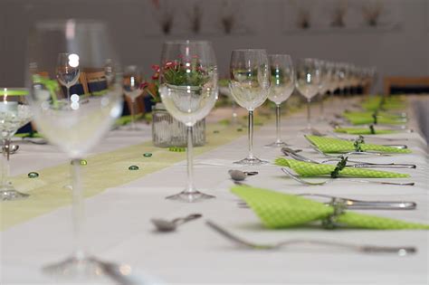 Royalty-Free photo: Selective focus photography of wine glasses and forks with table napkins ...