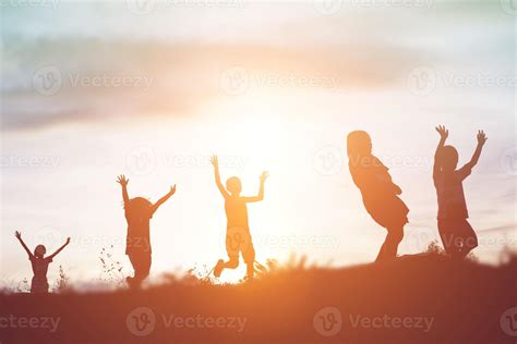 silhouette of a happy children and happy time sunset 7966349 Stock ...