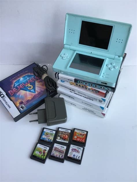 Nintendo ds Lite & 12 games - Catawiki