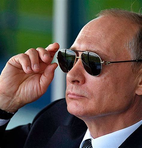 putin-on-glasses | The Canadian Press