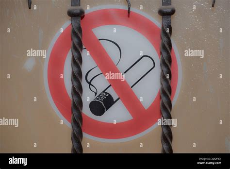 smoking ban or smoking prohibited sign with pictogram of a filter ...