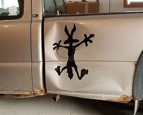 The Wile-E Coyote Vinyl Decal Is A Great Way To Make Car Dents Look Good