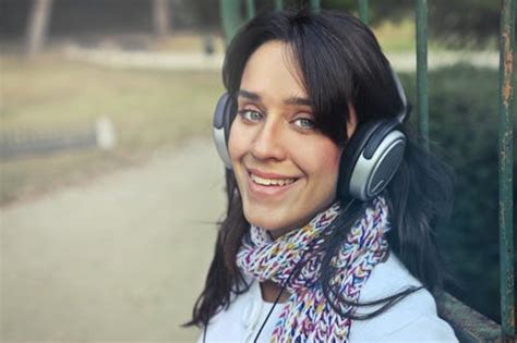 Woman Wearing Black On-ear Headphones · Free Stock Photo