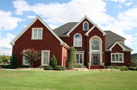 Shield your eyes... bright, bright red brick with white trim house ...