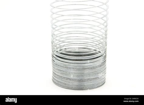 original metal slinky stretched rainbow Stock Photo - Alamy