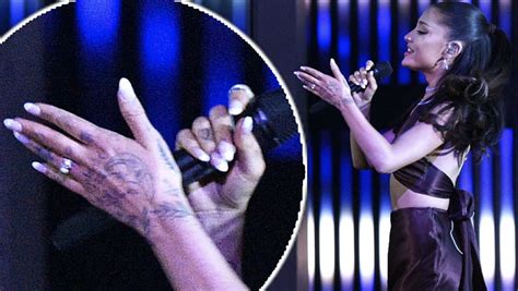 Ariana Grande flashes her unique engagement ring as she returns to ...