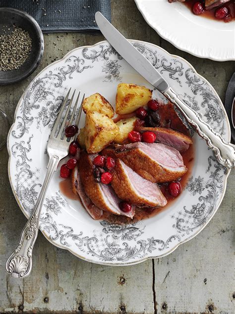 Roast duck with cranberry and sour cherry sauce recipe - olive magazine