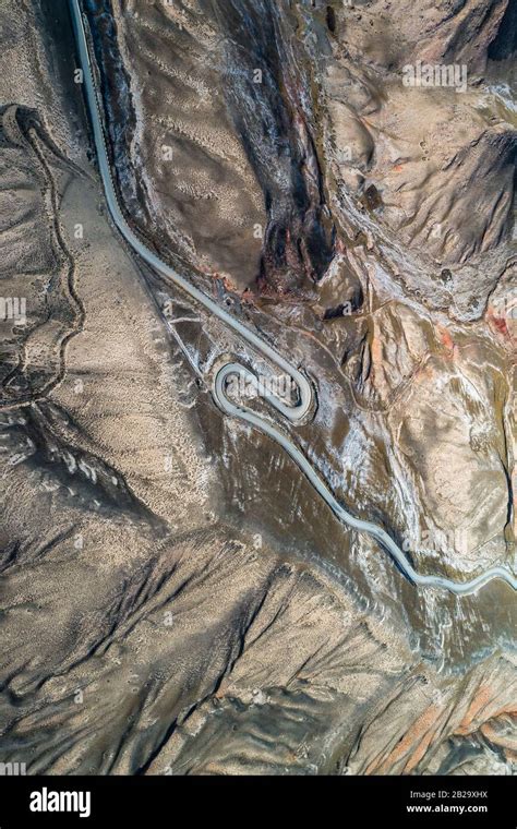 aerial view of the curved Qilian mountain road Stock Photo - Alamy