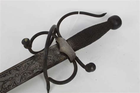 Lot 886 - Reproduction Spanish Toledo sword with