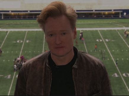 Clueless Gamer Conan O'Brien plays games on giant stadium screen - VG247