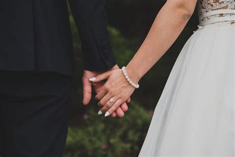 Young married couple holding hands – Liberty Church of Christ