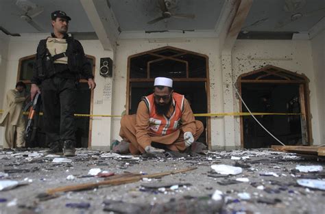 Taliban attack Pakistan Shiite mosque in Peshawar - CBS News