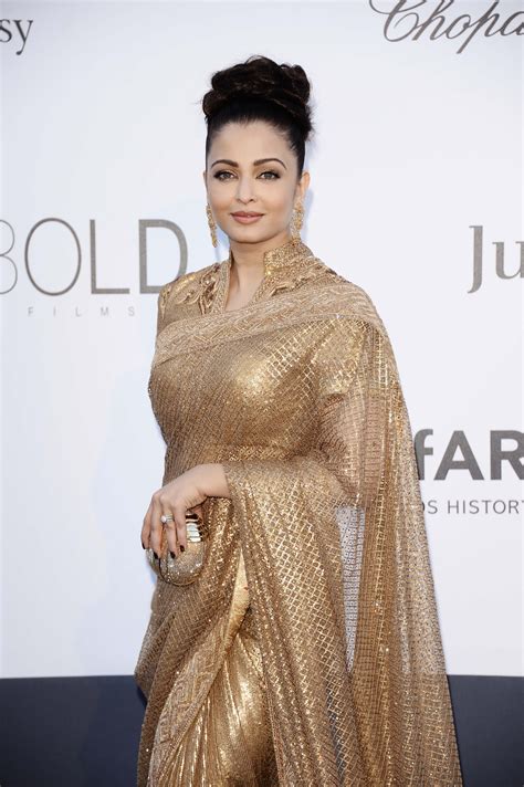 A golden moment for Aishwarya Rai at Cannes 2013. | Golden saree blouse designs, Golden saree ...