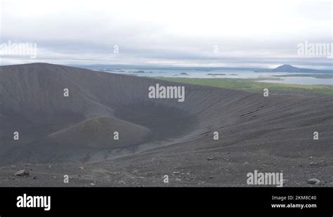 Hverfjall volcano ash crater in north Iceland with lake Mývatn in the Stock Video Footage - Alamy