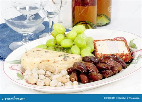 Wine and cheese platter stock image. Image of dates, plate - 2040049