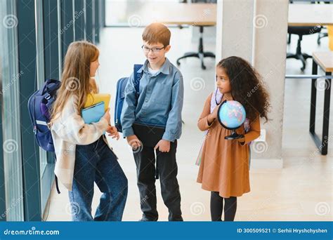 Portrait of Kids Standing in Elementary School Hallway Stock Image - Image of group, happy ...