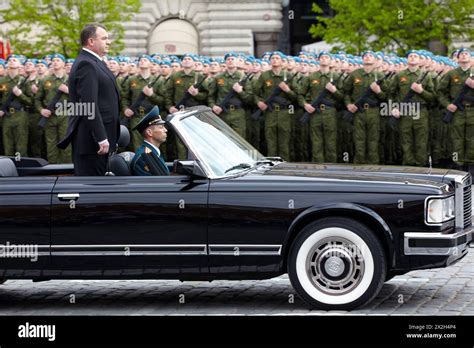 MOSCOW - MAY 9: Russian defense minister Anatoliy Serdyukov rides along rows of blue berets on ...