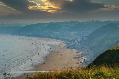 Premium Photo | Unique photo of sunset above the beach in filey