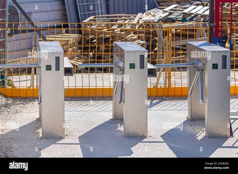 Turnstile Entrance to Construction Site Access Control Stock Photo - Alamy