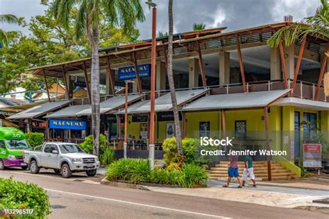 Airlie Beach Main Street Shops And Local Hotel Popular With Backpackers Stock Photo - Download ...