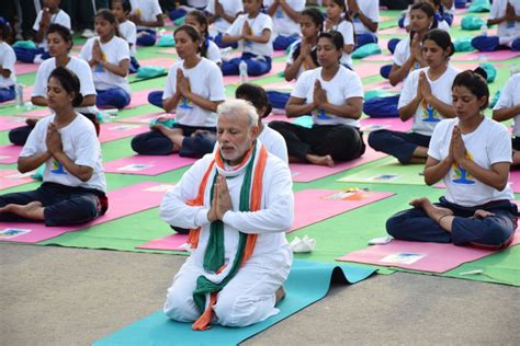 Prime Minister Narendra Modi performing yoga with the participatants on ...