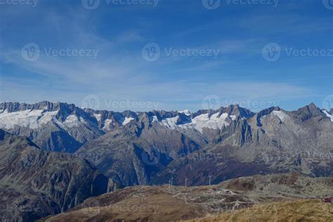 hiking in the swiss alps 10305801 Stock Photo at Vecteezy