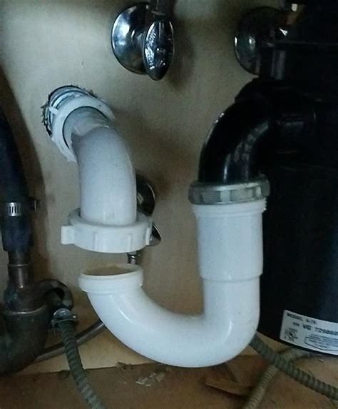 plumbing - New sink installation: garbage disposal sits lower and p-trap no longer at the right ...