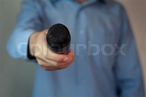 Interview with microphone. | Stock image | Colourbox