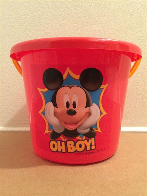 Mickey Mouse buckets used for centerpieces | Mickey mouse clubhouse party, Mickey mouse ...
