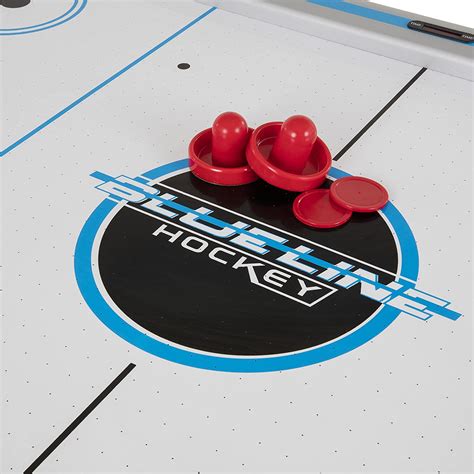 Small Air hockey Pucks vs. Large Air hockey Pucks | Air Hockey Place