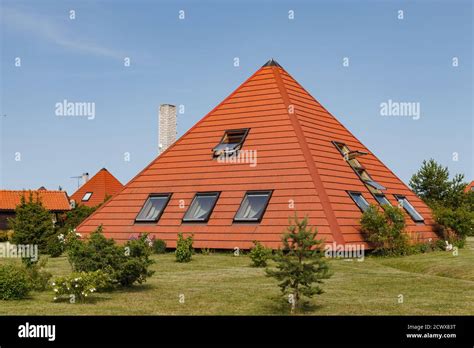 House build as pyramid. Tiled roof. Oriental approach used in Europe ...