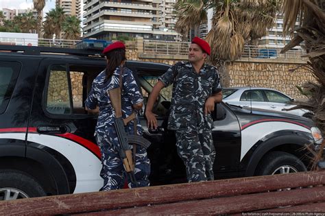 Lebanese police taking a breather in the shade,...