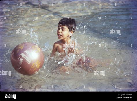 Child In Swimming Pool, Bombay, India Stock Photo - Alamy